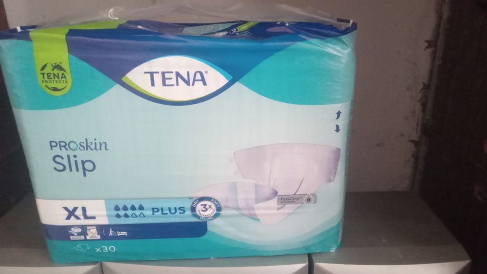 Tena XL  памперс