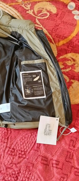 Продам новый пуховик