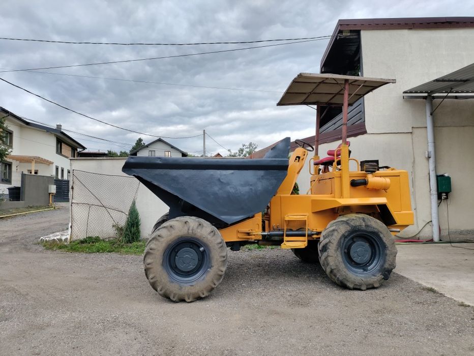 Buldoexcavator cu picon Dumper , Cilindru compactor