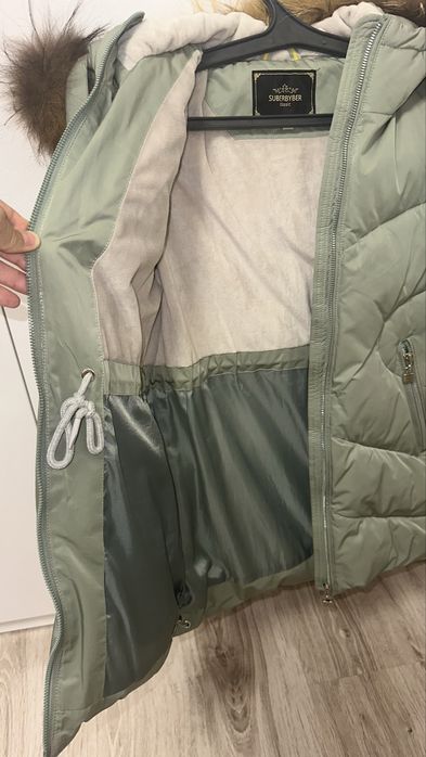 Продам пуховик на девочку р.134