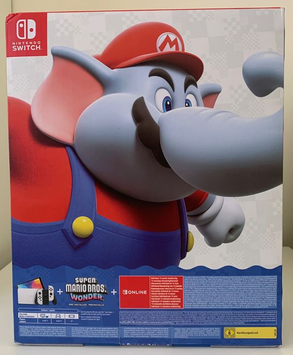 Nintendo Switch - OLED Model + Super Mario Wonder, Hogwarts Legacy