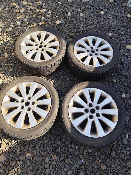 Set 4 jante aliaj 5X115 pentru Opel . Cu anvelope M+S 215/50R17.