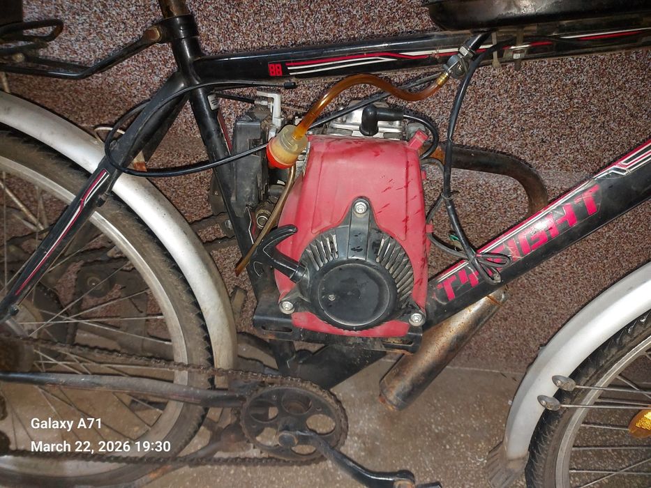 Bicicleta cu motor, aproape nou motorul