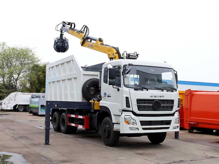 Мусоровоз с грейферным захватом