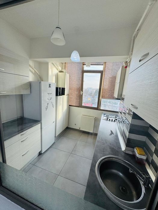 Închiriez Garsoniera tip Studio,  central, cu parcare