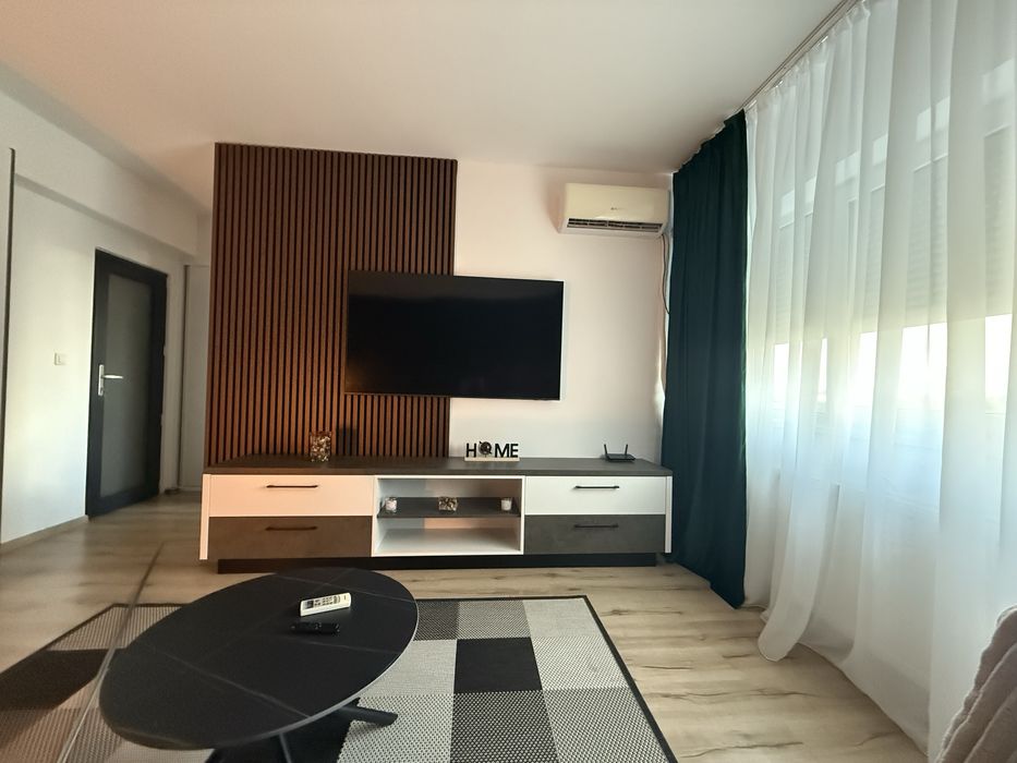 Inchiriez apartament o camera nou , alfa , arad !