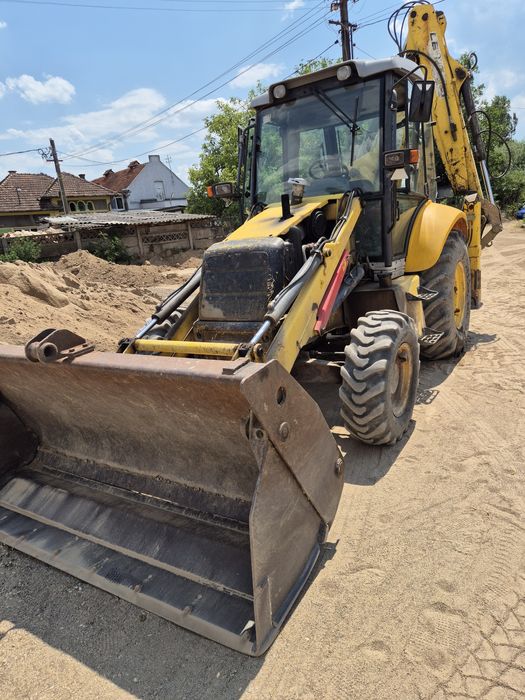 Buldoexcavator New holland an 2006