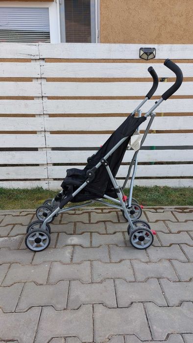 Carucior copii bebe Model pliabil foarte usor 4 kg , pt luat in avion Marca Kolcraft Cloud