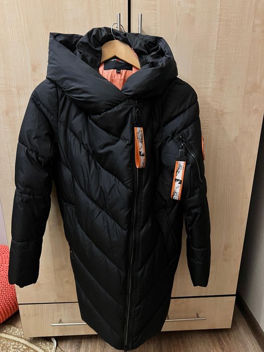 Продам пуховик б/у