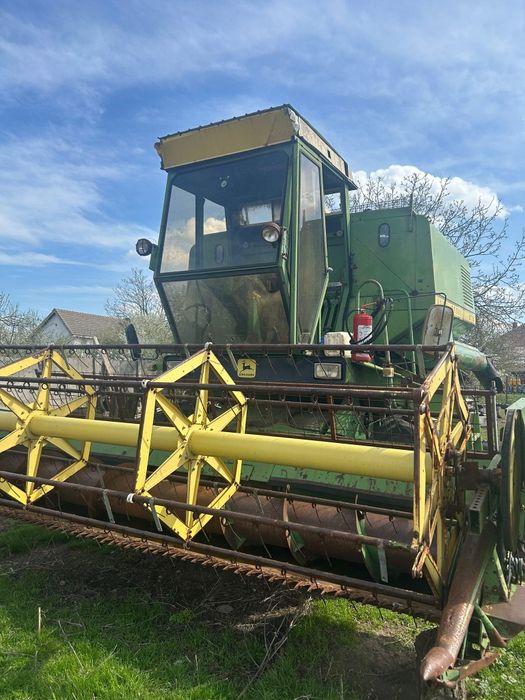 Combina John  Deer 975 cu motor defect sau odezmembrez.