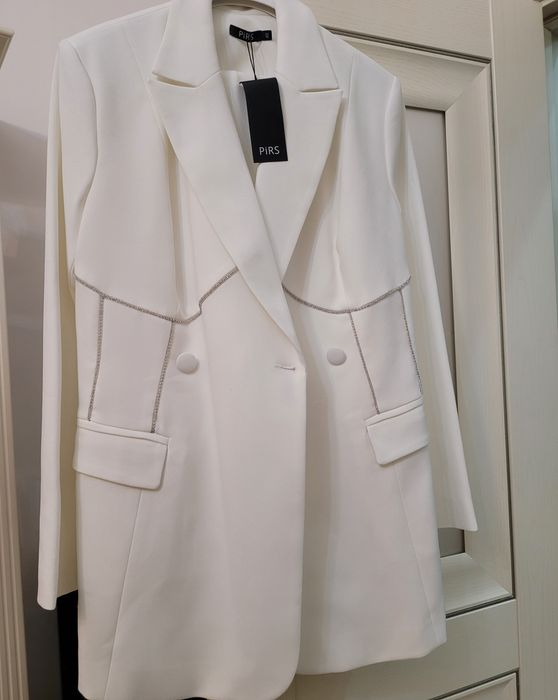 Продам костюм новый