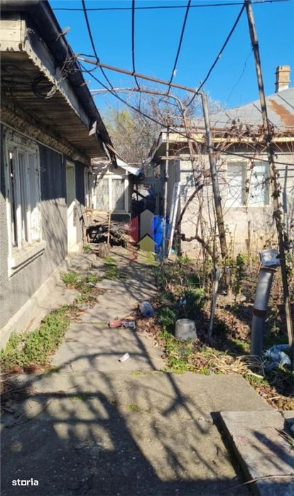 Teren+casa batraneasca 261 mp deschidere 10 m Brailita Pisc Stadion