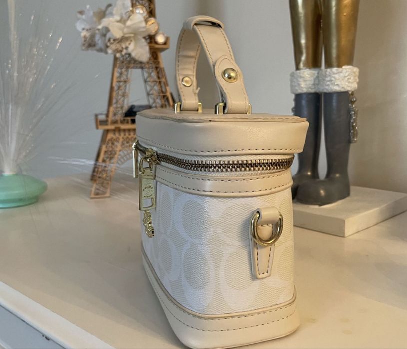 Маленькая сумка коач