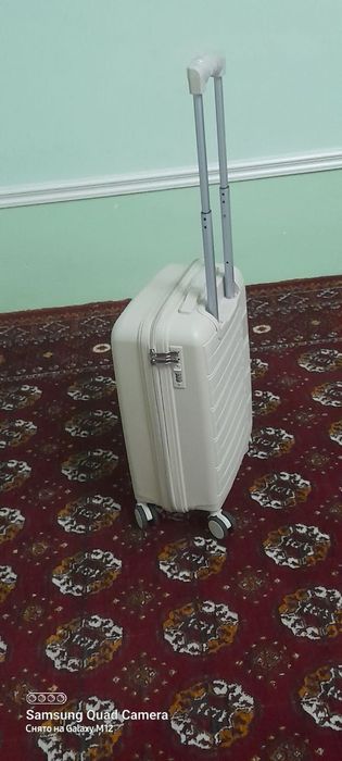 Tozo ishlatilmagan chamadon