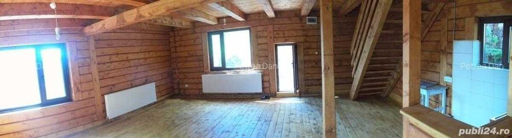 Casa din lemn masiv cu teren in Muntele Rece
