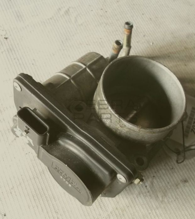 Дроссельная заслонка ниссан