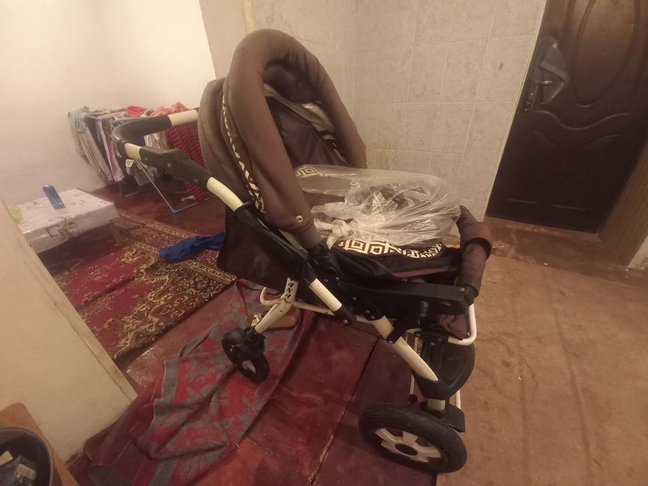 Здравствуйте  коляска новый коляска