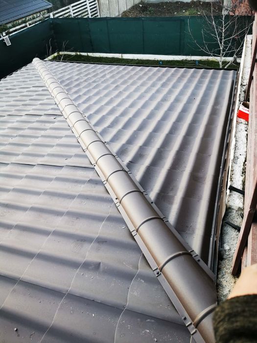 Montaj acoperis tigla metalica reparatii acoperisuri tabla cutata velu