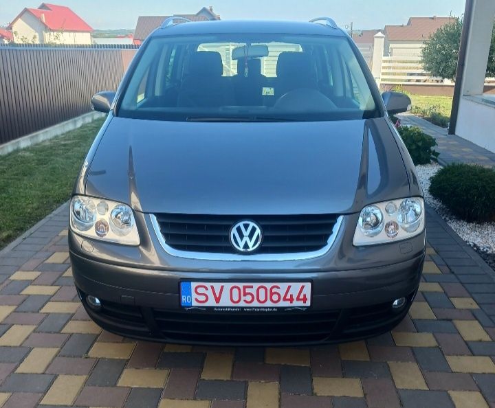 Vând Touran Wolkswagen