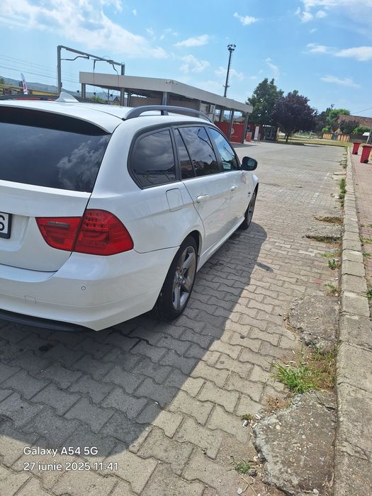 vând BMW e91 x drive