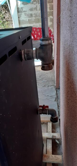 .Камина с водна риза за парно отопление с пет радиятора и една серпент