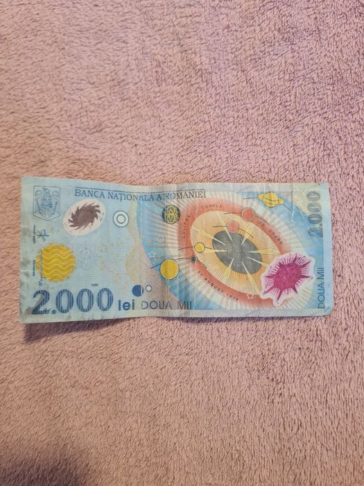 Vand bancnota 2000 lei eclipsa
