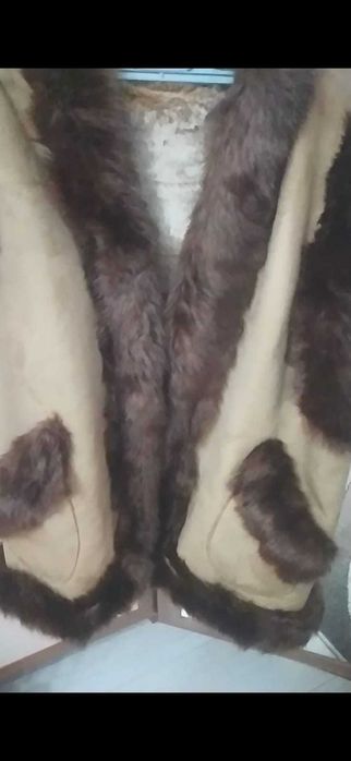 Жилетка  теплая новая