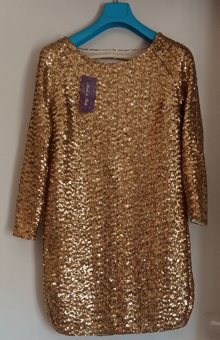 Официални блестящи рокли с лоторки сребристи златисти и черни цветове.