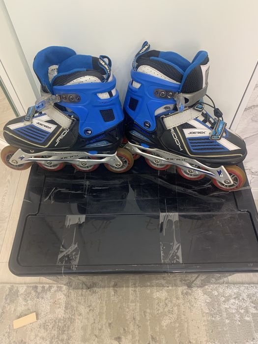 Роликовые коньки