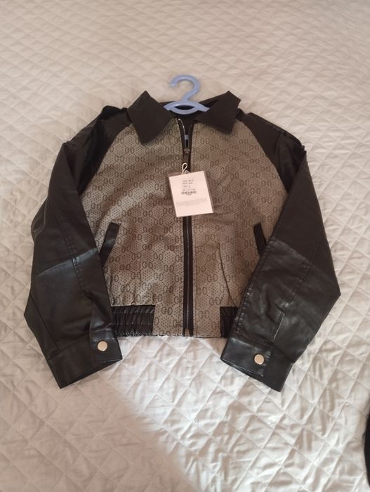 Kurtka yangi kiyilmagan 46 L razmer