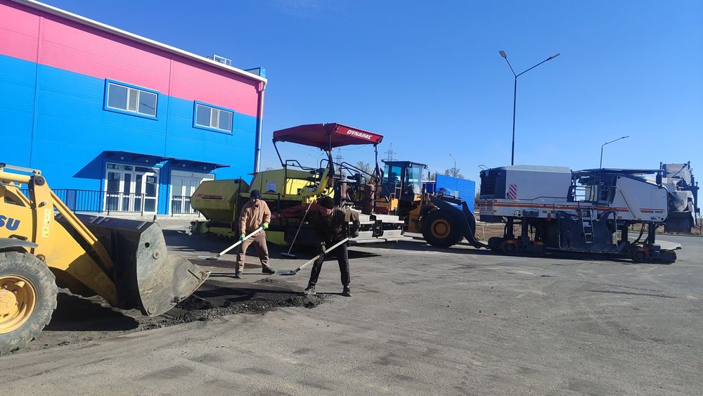 Укладка асфальта , асфальтирование