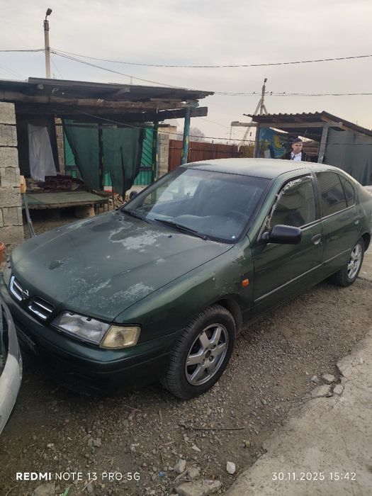 Ниссан примера р11