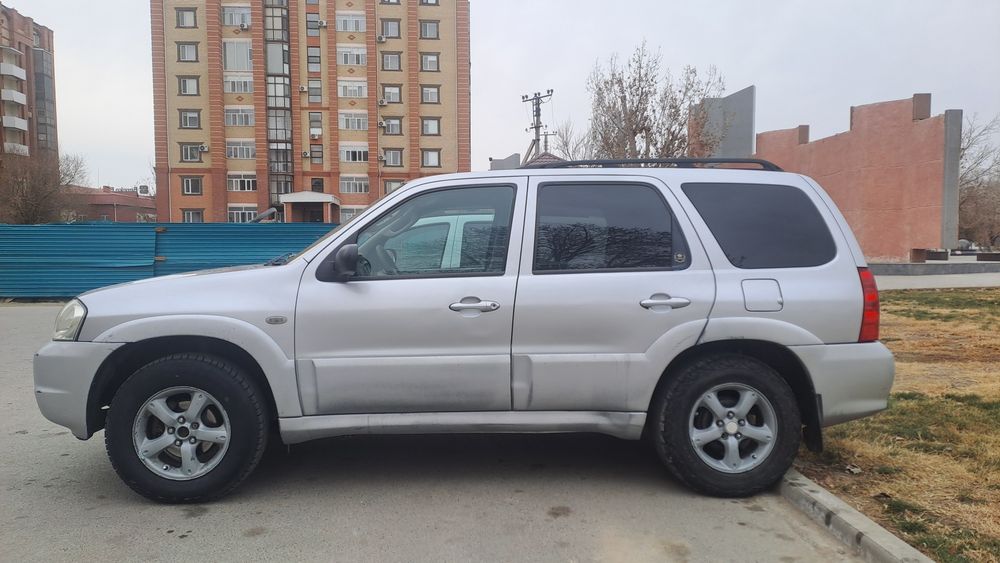 Мазда трибют 2,3