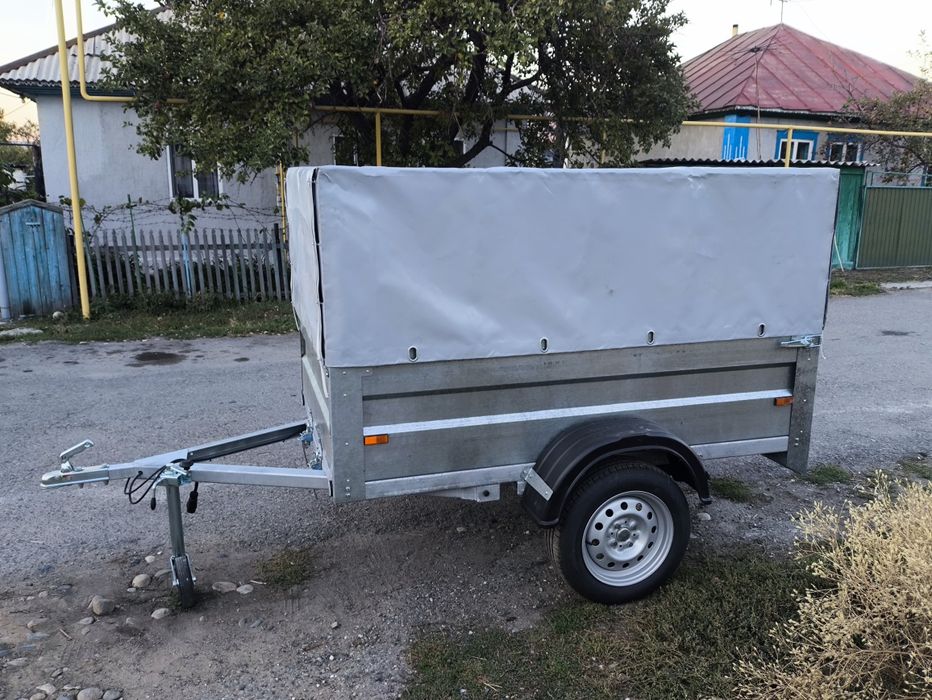 Прицеп новый с тентом легковой