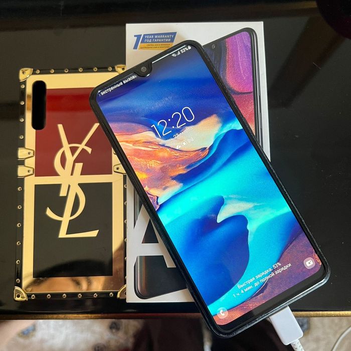 Телефон А 50, ноутбук