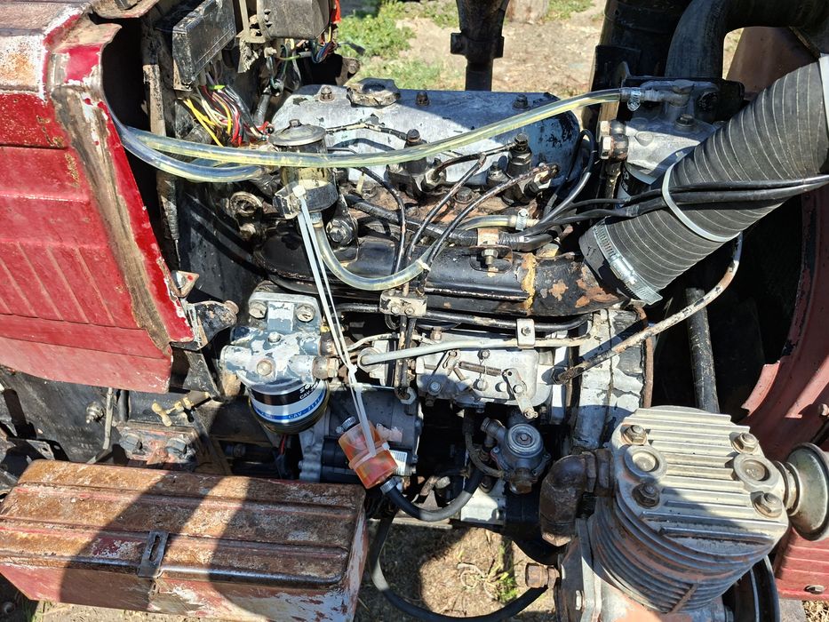 Tractor  U 445  cu plug și remorcă