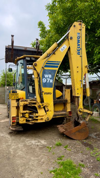 Vând buldoexcavator Komatsu 97