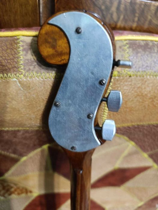 9-клёпочная домра