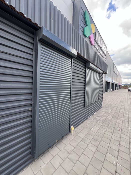 Рольставни , Секционые ворота