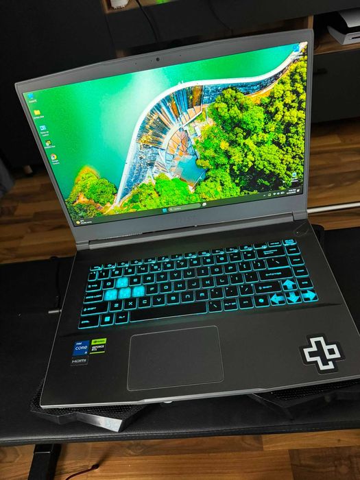 Laptop Gaming MSI Thin 15 | RTX 4050 (6GB) | i5 | 16GB RAM | 1 An Garanție, Ca Nou + cooler de racire gaming