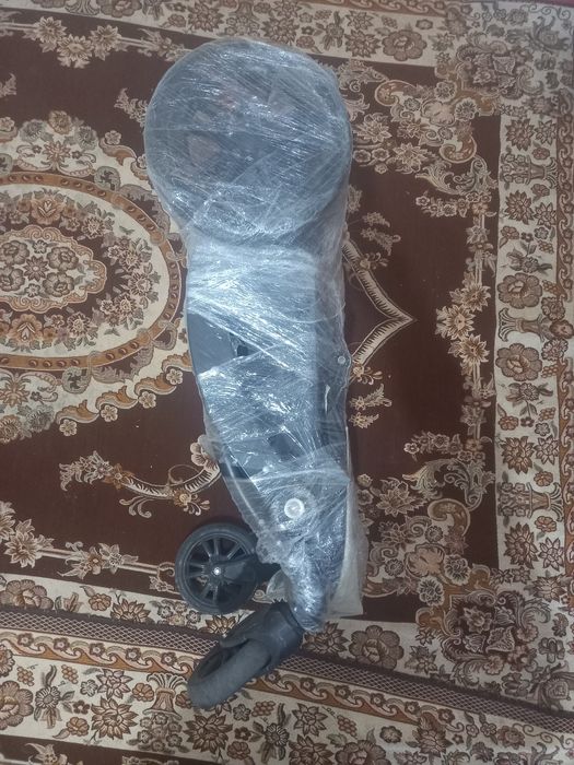 Коляска  тез арада