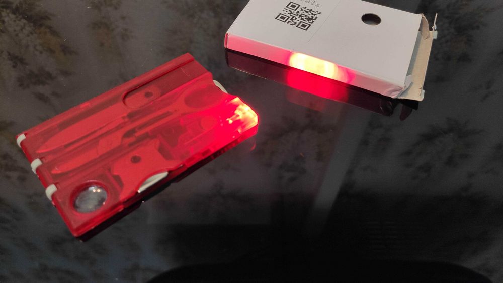 Мультитул по типу Swiss Card(Китай) - ножницы, ручка, фонарь, отвёртка