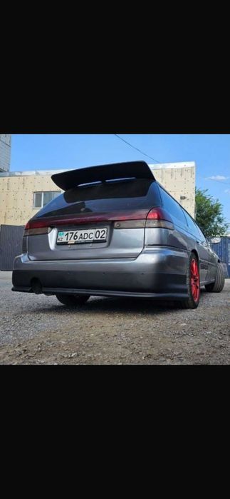 Передний обвесной бампер Subaru Legacy B3