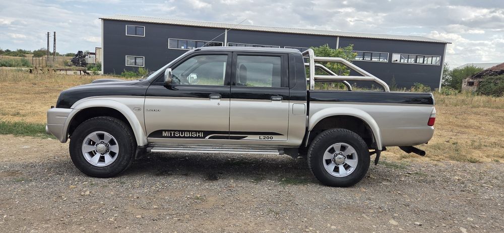Mitsubishi L 200 climatronic 4x4 Diferitial blocabil la buton