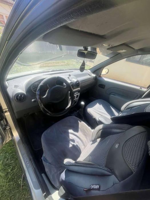 vând dacia logan