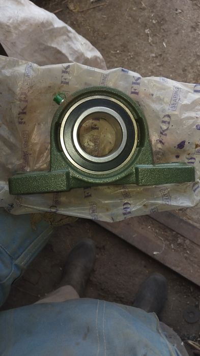 Продам подшипник в корпусе.