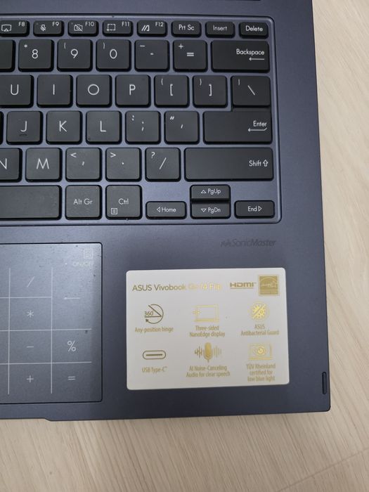 Vând laptop 2-in-1 ASUS VivoBook Flip 14 TP1401KA – touchscreen, rabatabil 360°