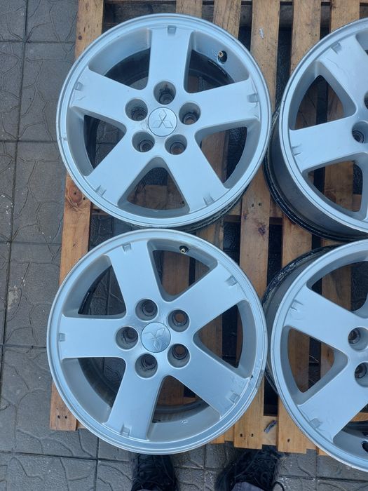 4ри бр алуминиеви 16цола;5×114,3; ет 40; 67.1мм; оригинални  Митцубиши