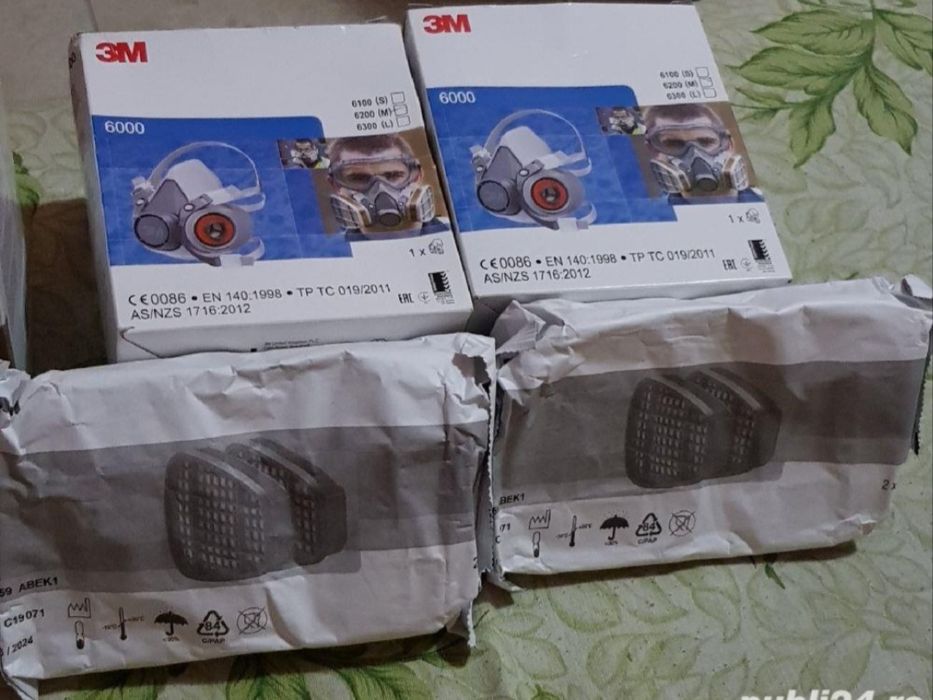 Masca de protectie : praf fum gaze chimicale lacuri vopsele mirosuri .