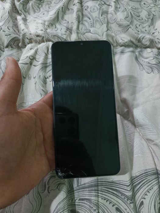 Realme not 60x. Xotira 64/3+2. Aybi burchagida katilgan joyi bor.